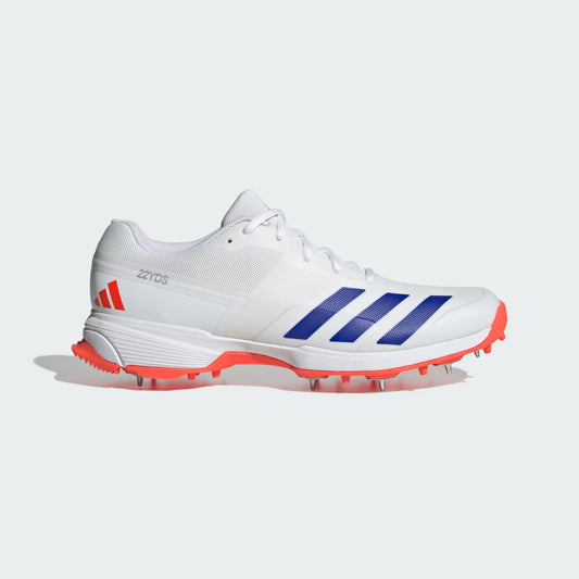 White sports shoe with blue stripes and red soles on a white background