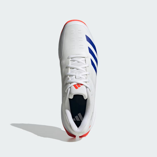 White athletic shoe with blue and red accents on a white background