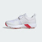White golf shoe with red accents on a light gray background