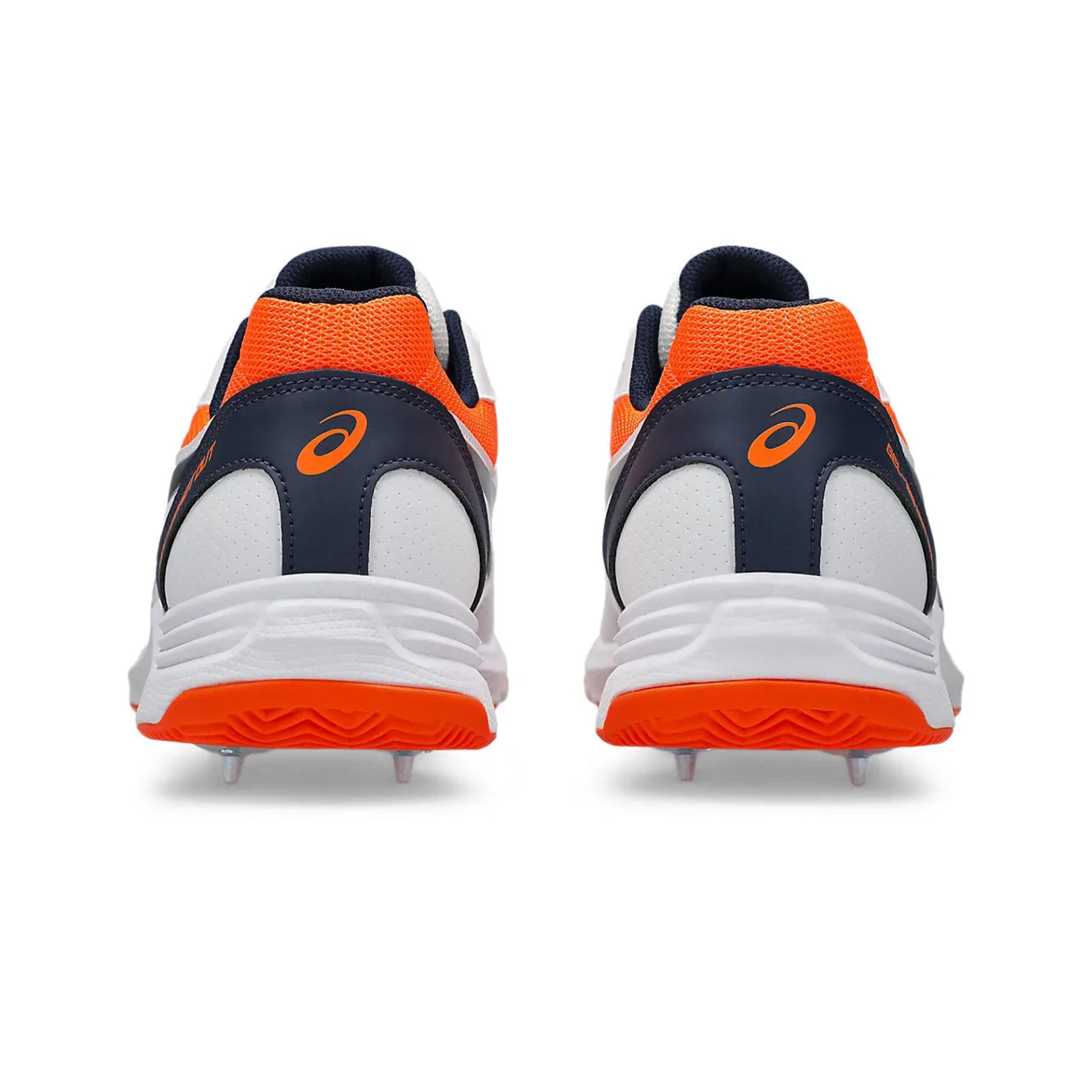 Pair of sports shoes with orange and black design on a white background