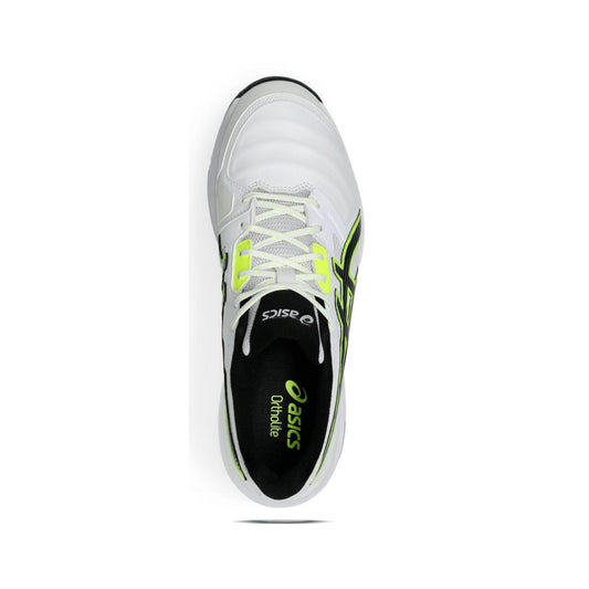White running shoe with green accents on a white background