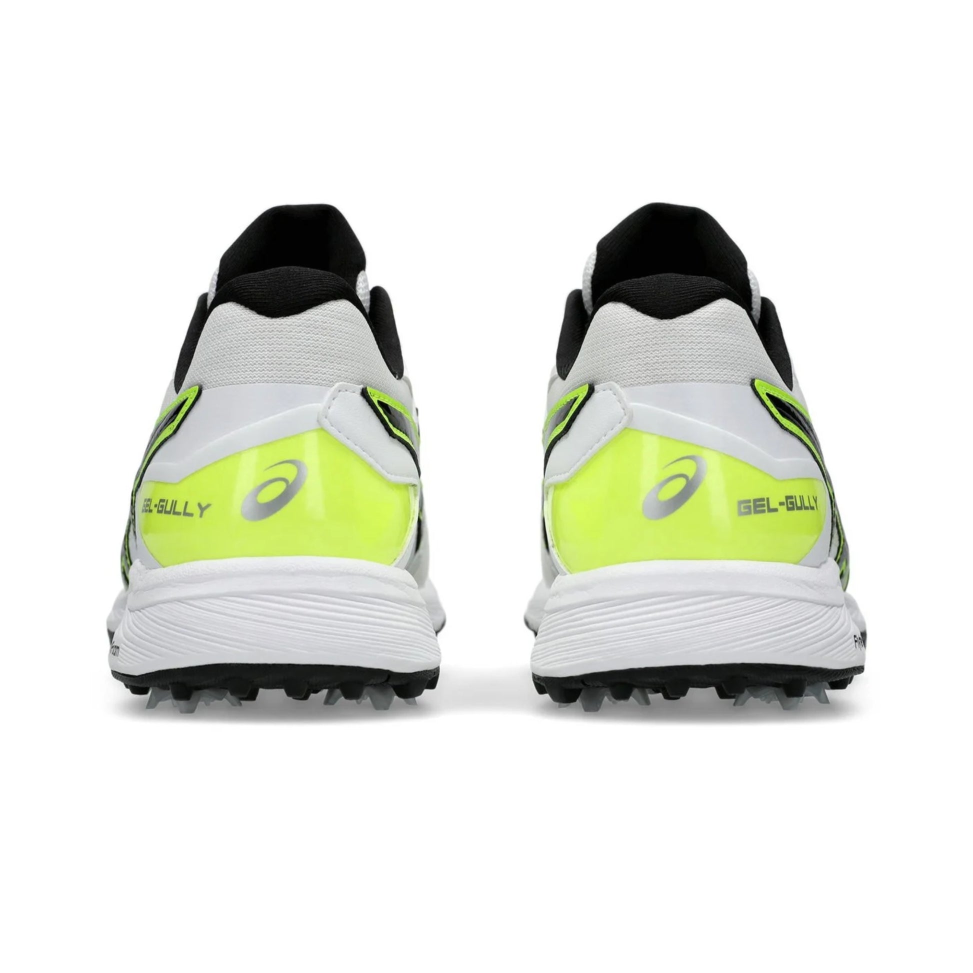 White and black sports shoes with green accents on a white background.