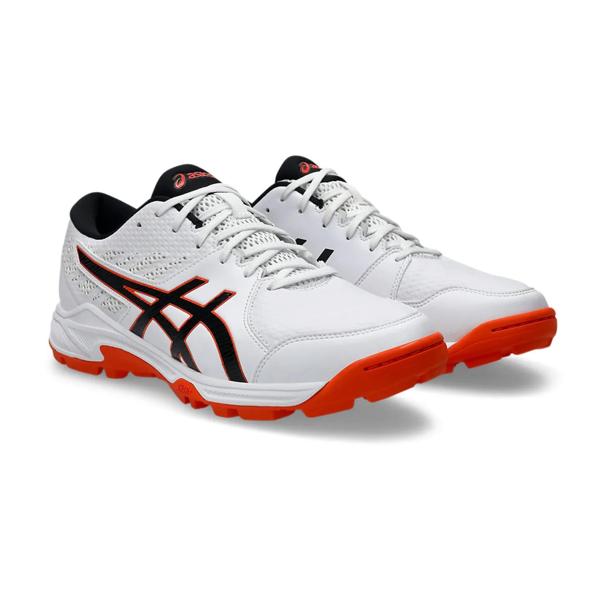 White athletic shoes with black and orange accents on a white background