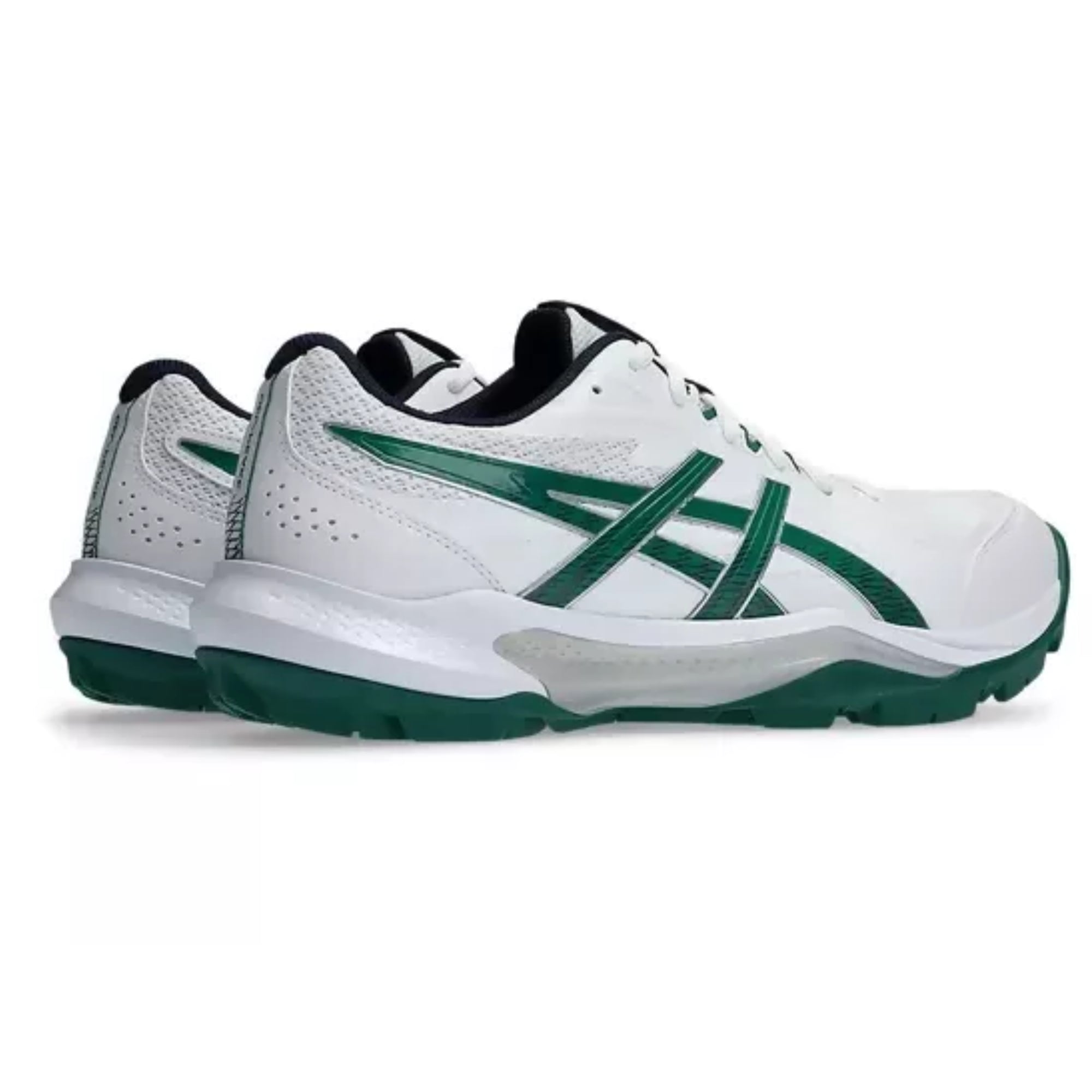 White and green athletic shoes on a white background