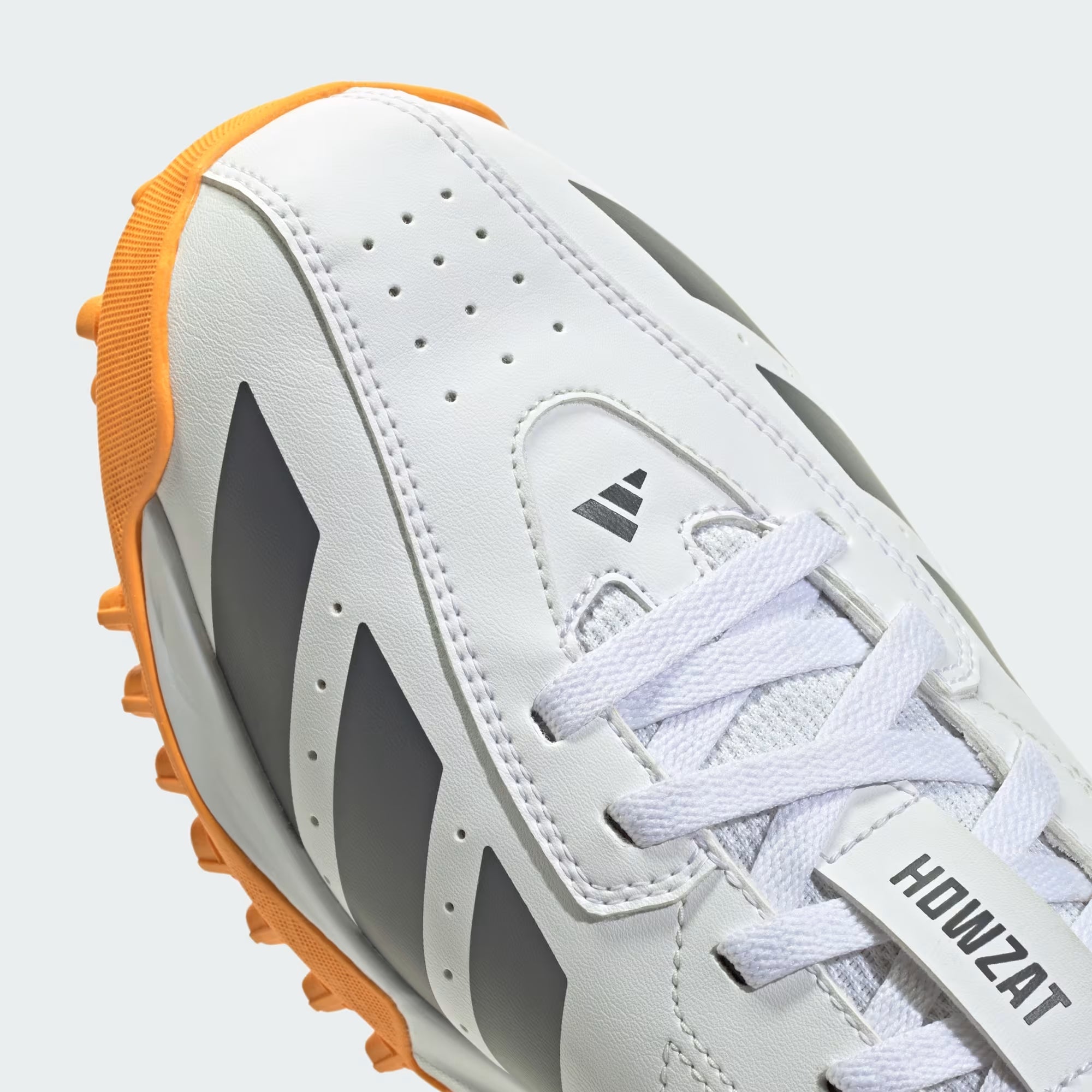 adidas Howzat Spikeless Cricket Shoes Cloud White / Aurora Onix / Lucid Tangerine