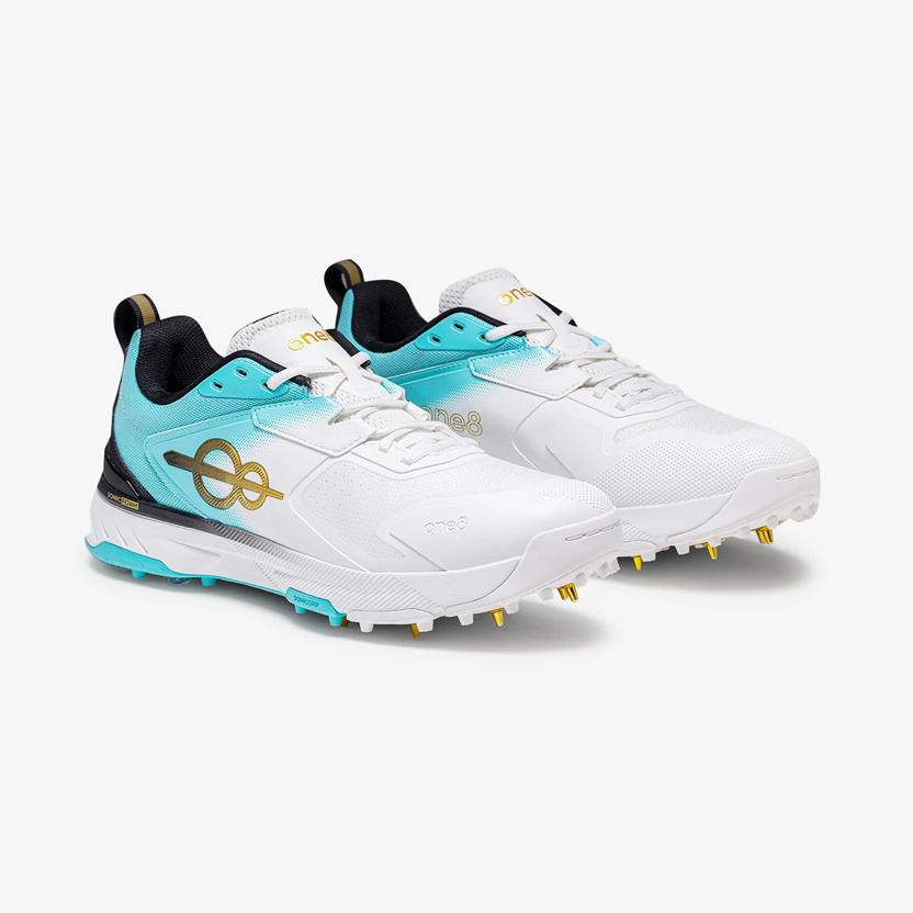 gold spike cricket shoes in white and teal, side view, Apex Stride Sports Karachi