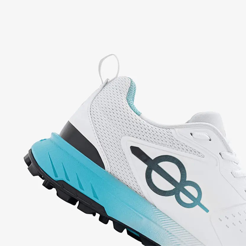 Close-up of Pitch 18 cricket shoes cushioned teal midsole and breathable mesh upper