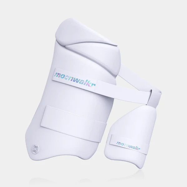 White shin guards with 'moonwalker' branding on a light gray background