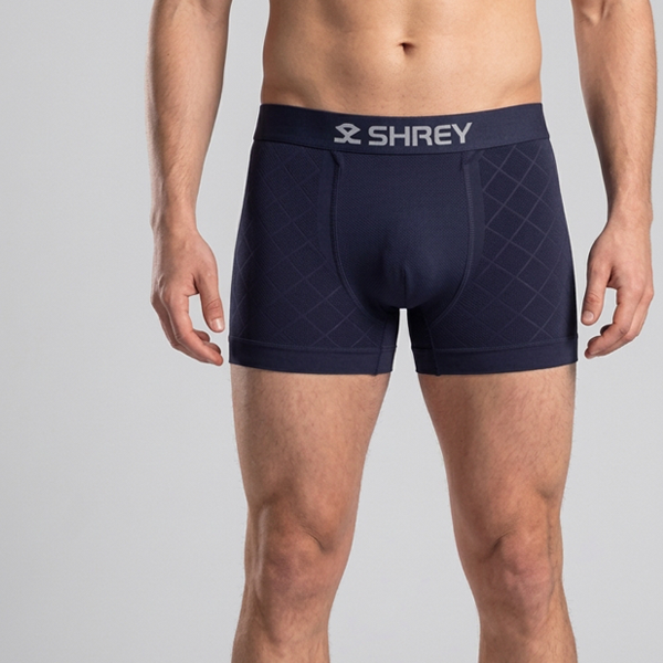 Front view of Shrey navy boxer trunks for men with diamond pattern and stitched front panel
